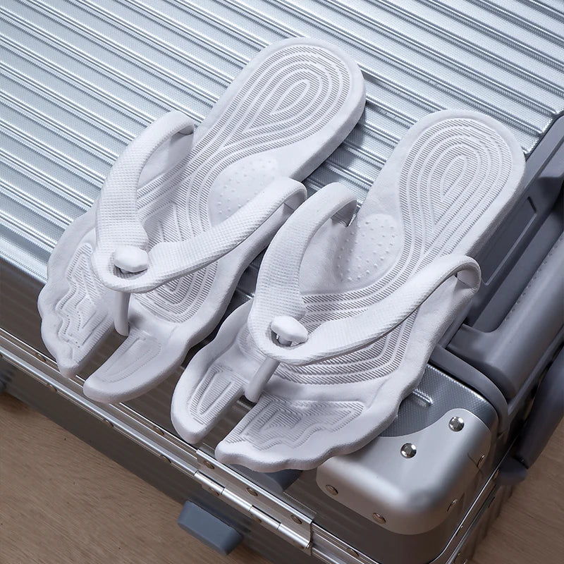 A pair of portable folding slippers for travel and business trips, couple beach flip flops, hotel bath non slip slippers