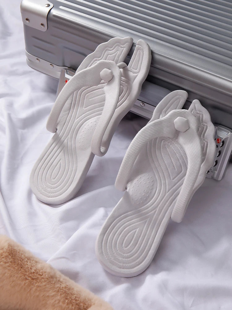 A pair of portable folding slippers for travel and business trips, couple beach flip flops, hotel bath non slip slippers