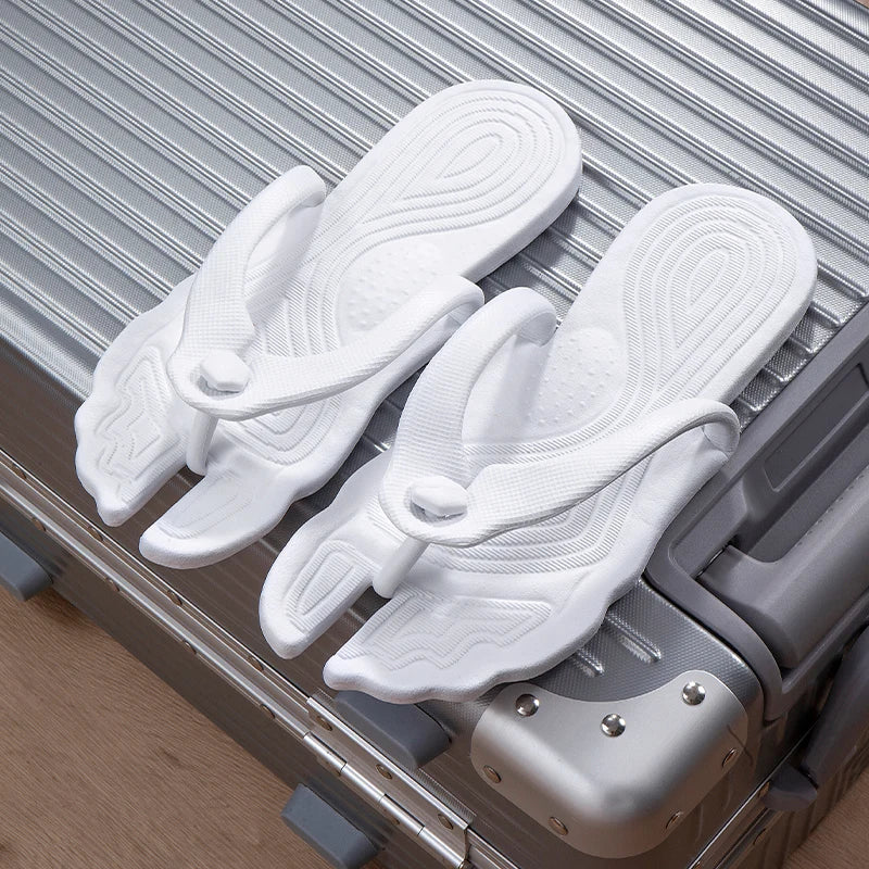 A pair of portable folding slippers for travel and business trips, couple beach flip flops, hotel bath non slip slippers